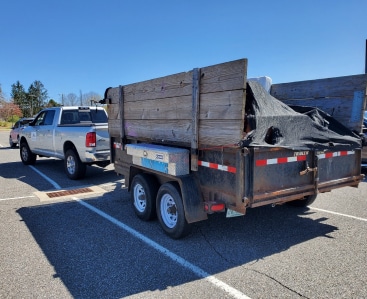 C-&-M-Carting-Solutions-truck and trailer in parking lot